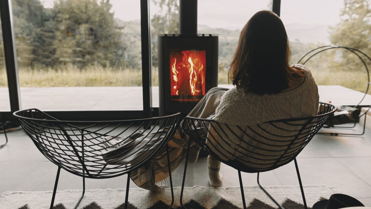 Boeing employee sitting next to the fireplace, enjoying retirement