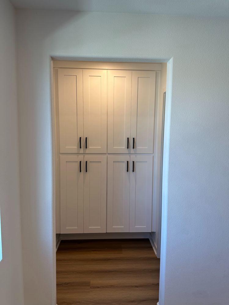 Built-in shaker cabinets on new flooring