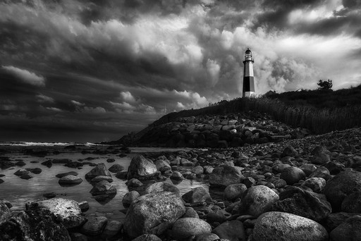 A narrow canyon with orange rocks
