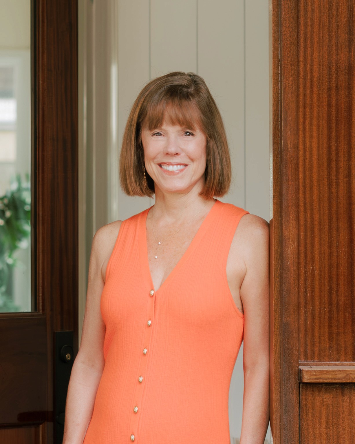 person sitting in a chair in front of a man