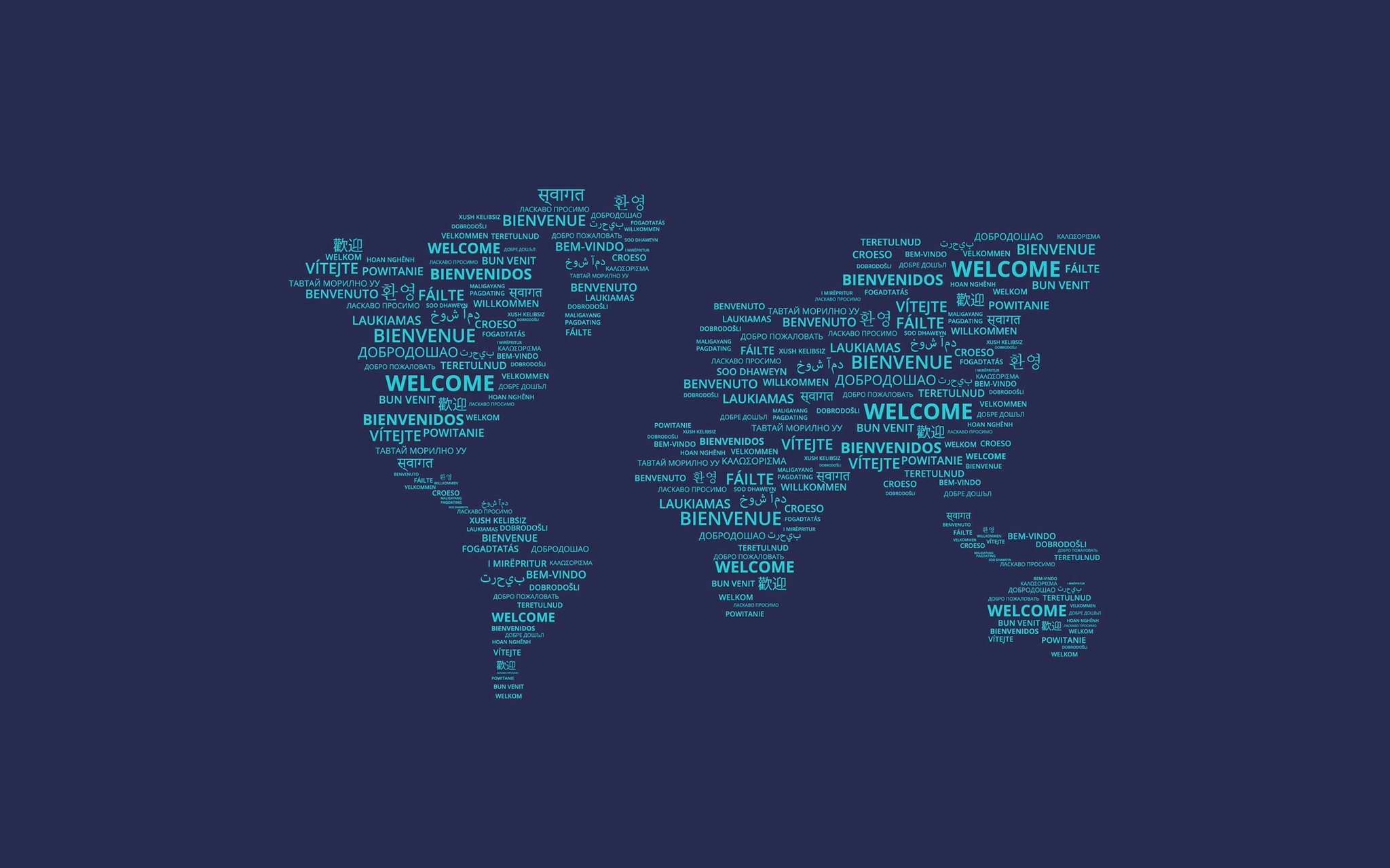 A couple of kids that are sitting in the grass