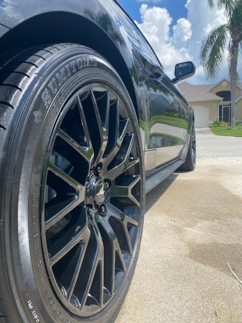 Mustang after a full exterior detail with freshly wash and dressed tires