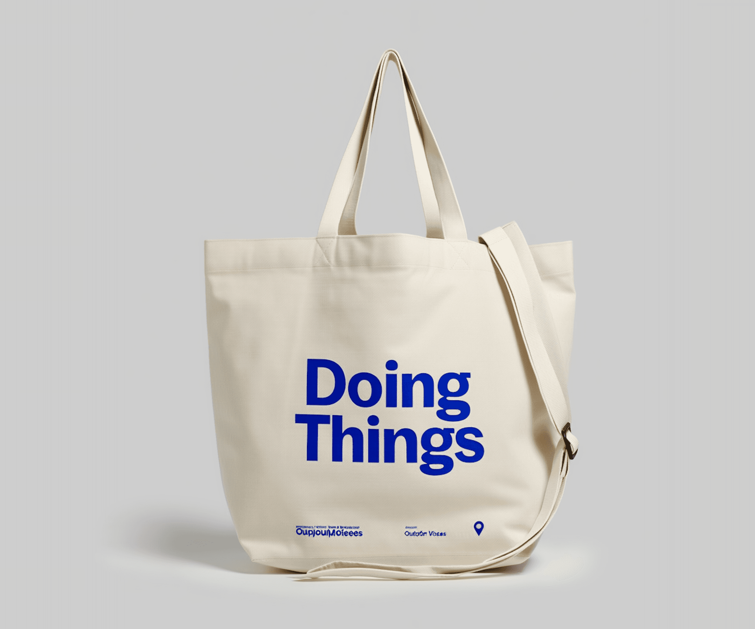 Close-up of a white flower in soft window light with gentle shadows on a pale gray background.