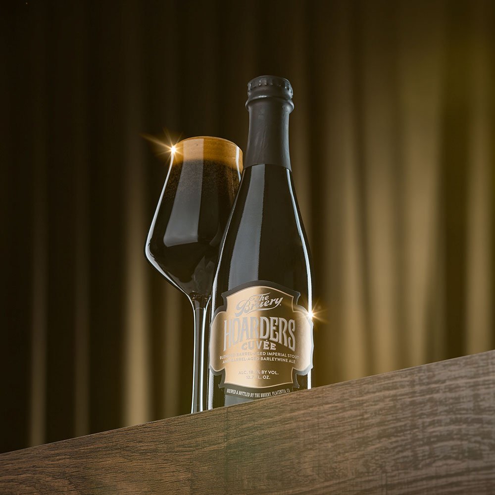 The Bruery glass of beer with golden lighting