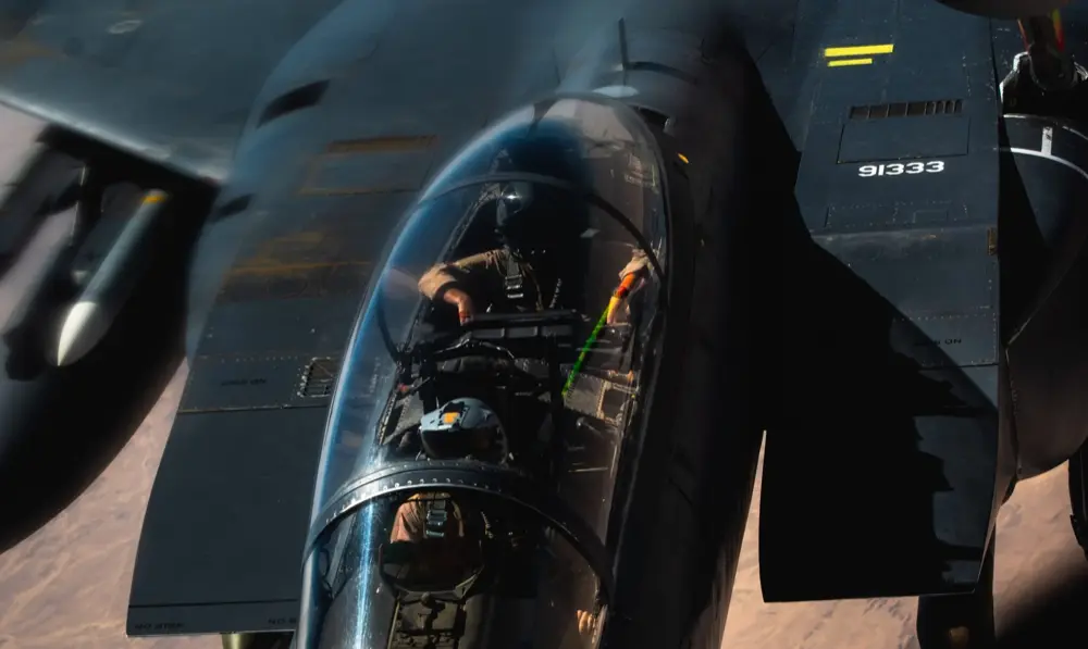 Pilot in a fighter jet cockpit mid-flight — Semantic CMMC compliance