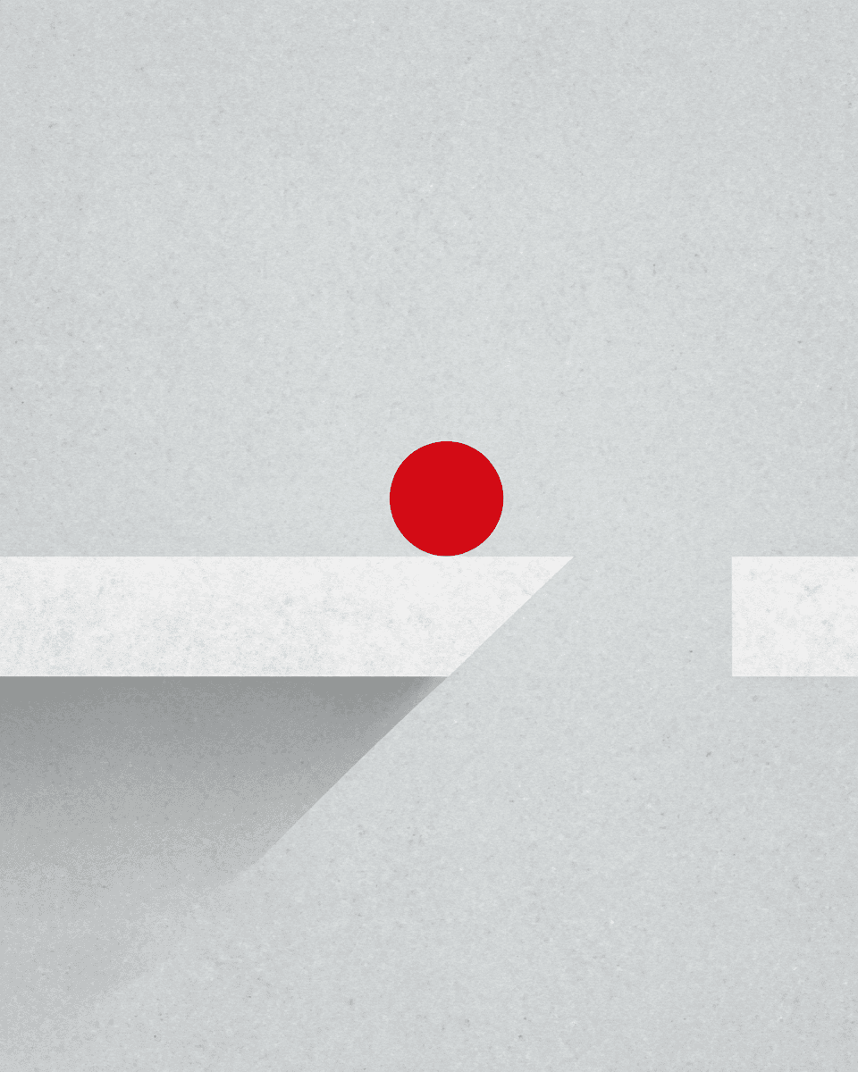 A school building stands against the backdrop of a clear sky