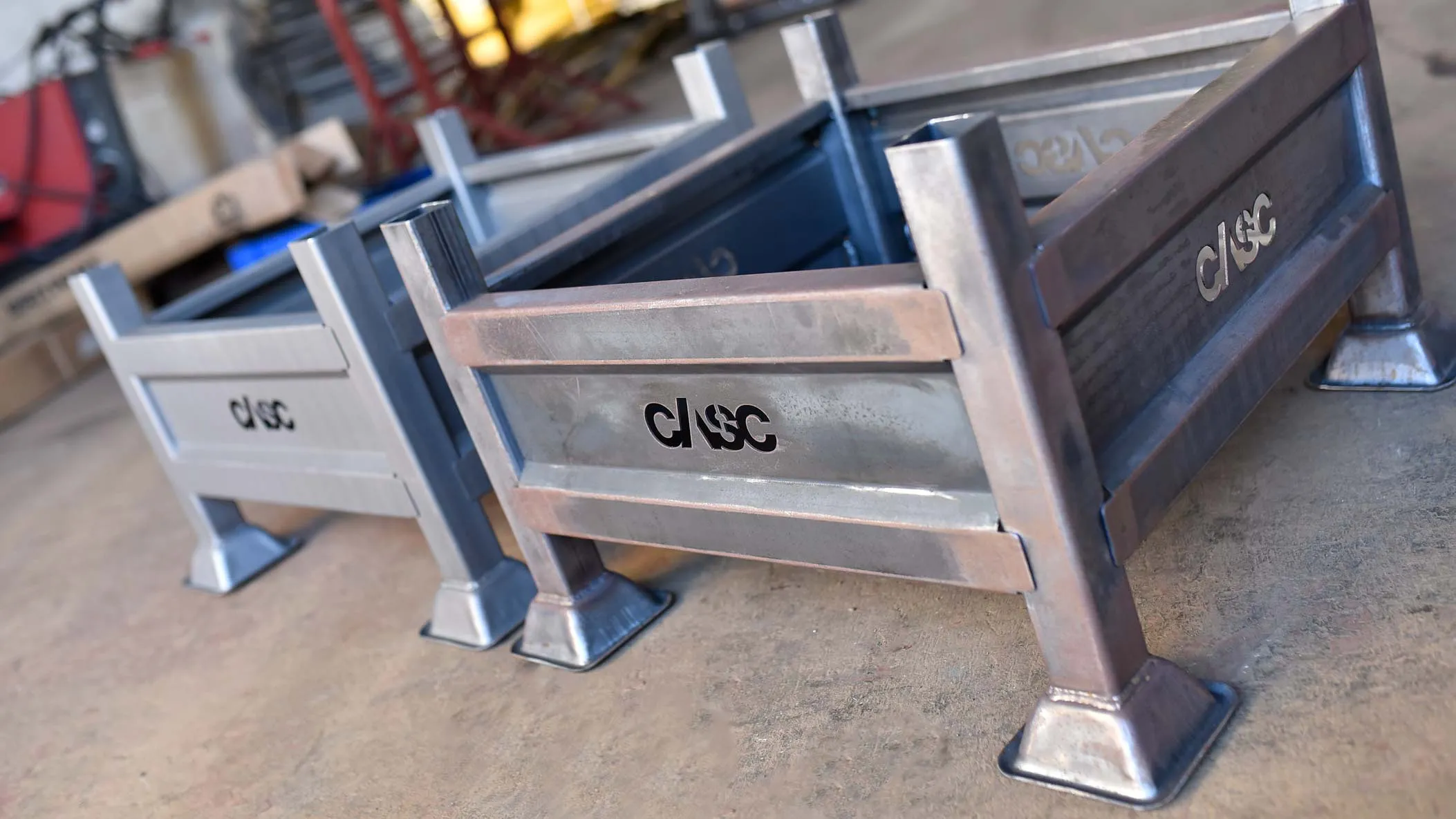 CASC-fabricated steel components shown before and after surface finishing, highlighting the difference between untreated metal and the finished, coated surface.