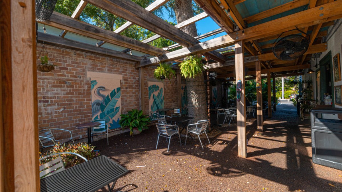 Two chefs behind the kitchen counter