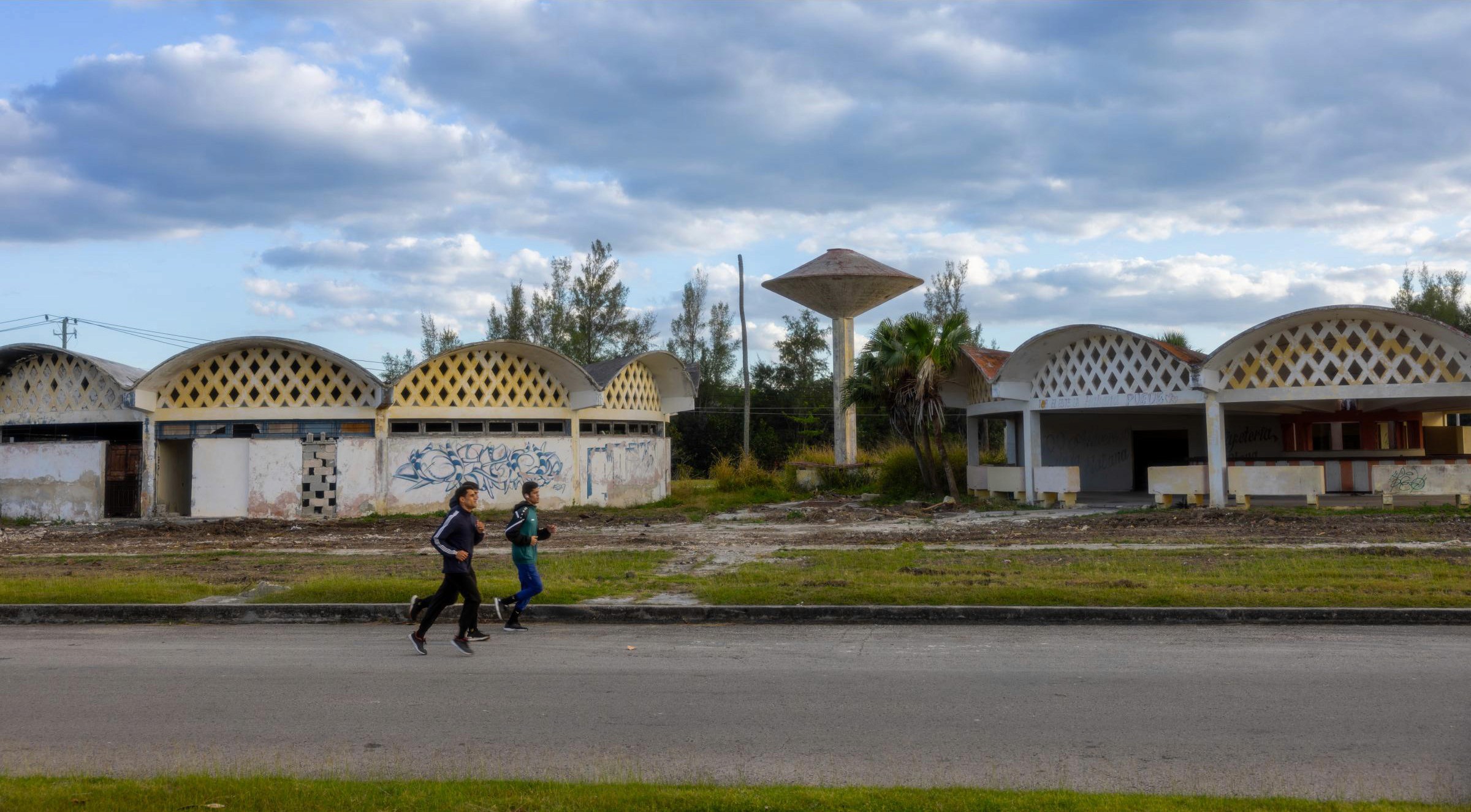 A few locals out for a run near Playa MarAzul