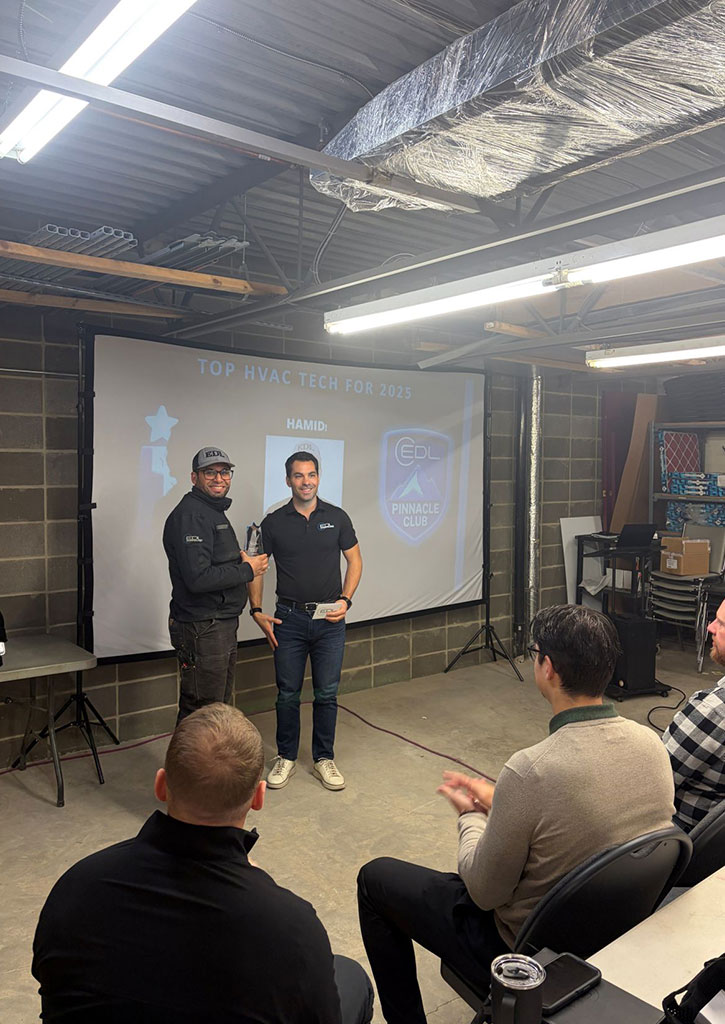 An aerial shot of EDL team members swimming at a lake.