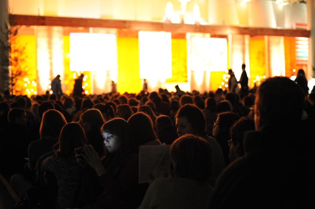 people sitting on chair inside building