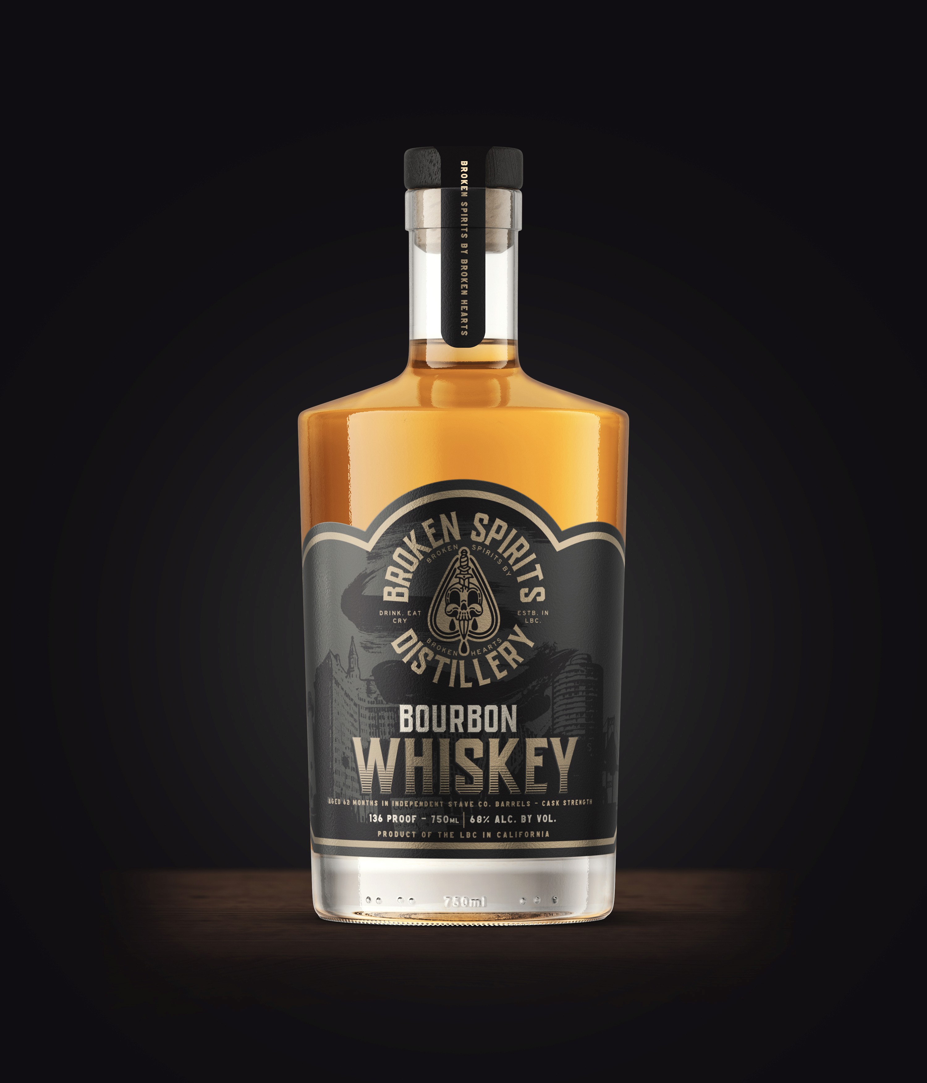 Broken Spirits bourbon bottle with gold label on dark backdrop