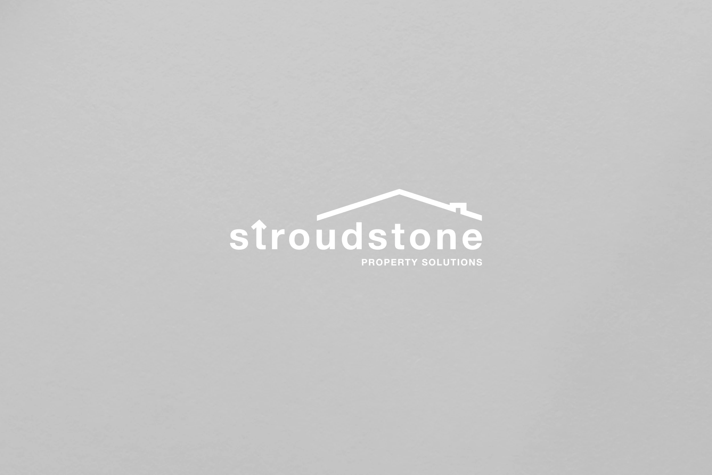 Corporate business card and stationery design for Stroudstone with minimalist branding and orange visual identity.