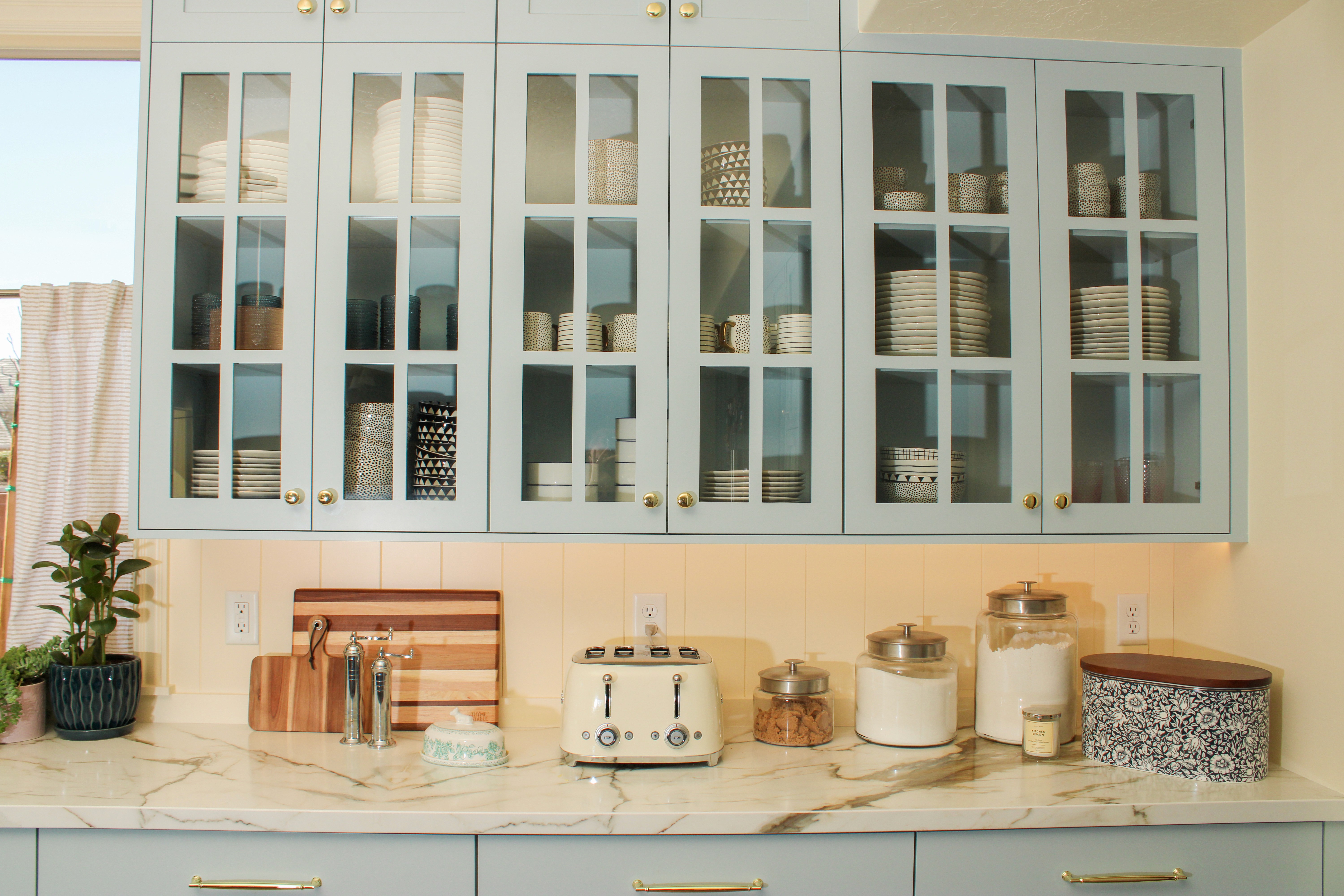 Functional and stylish kitchen in a Southern Utah home with modern layout and pale blue cabinetry