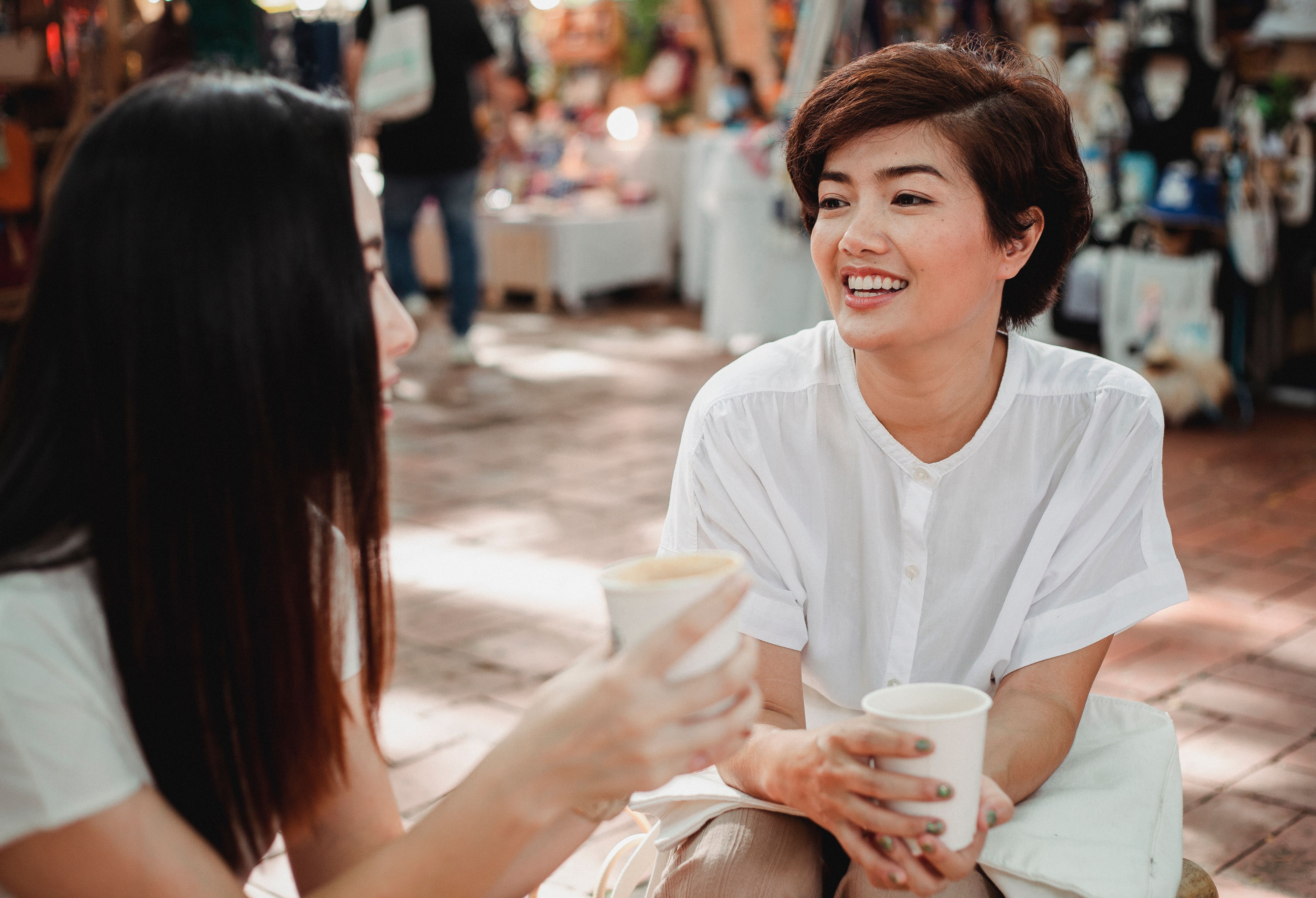 Two women sat talking