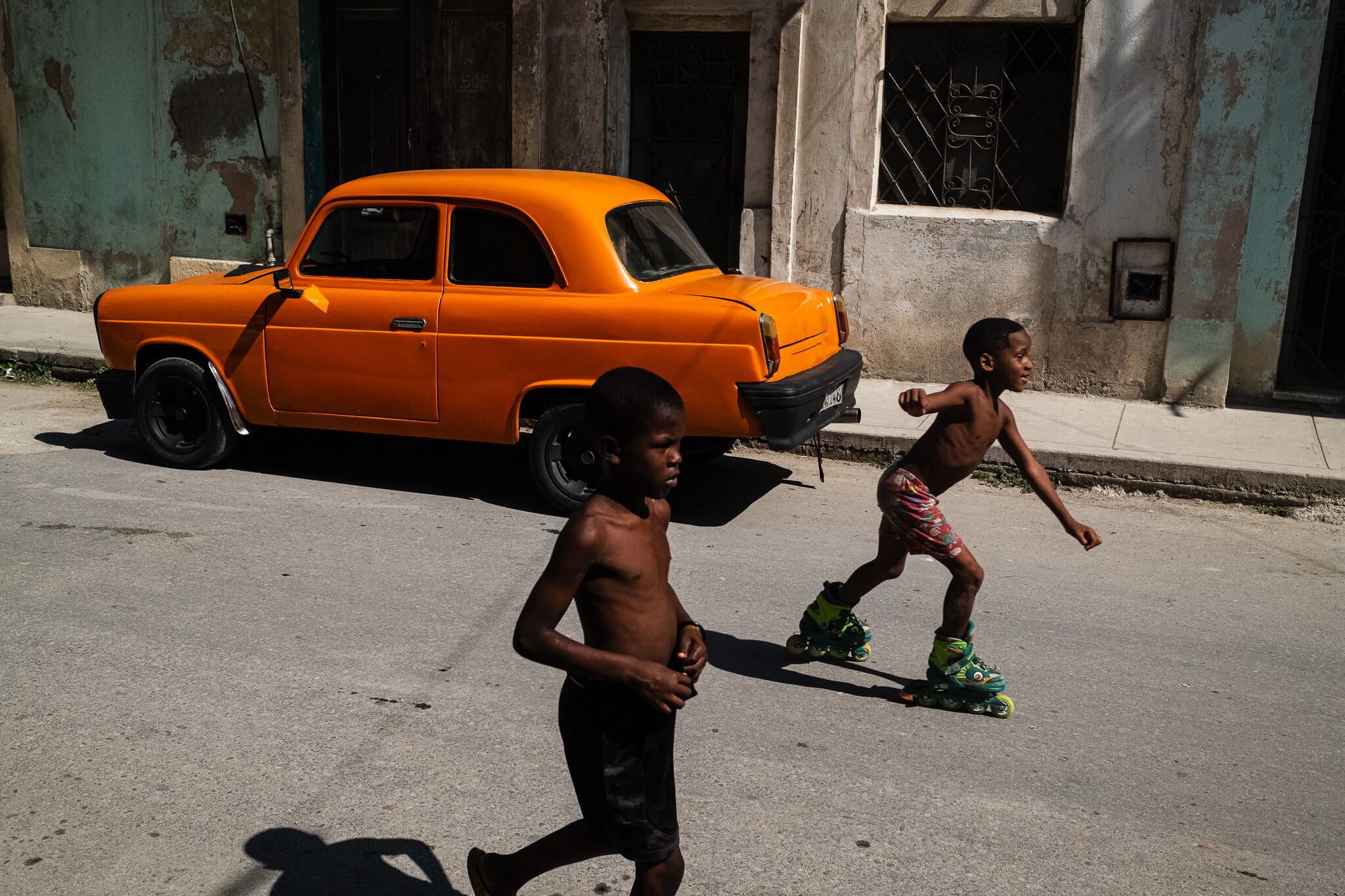 KIDS PLAYING OUTSIDE DURING THE DAILY BLACKOUT