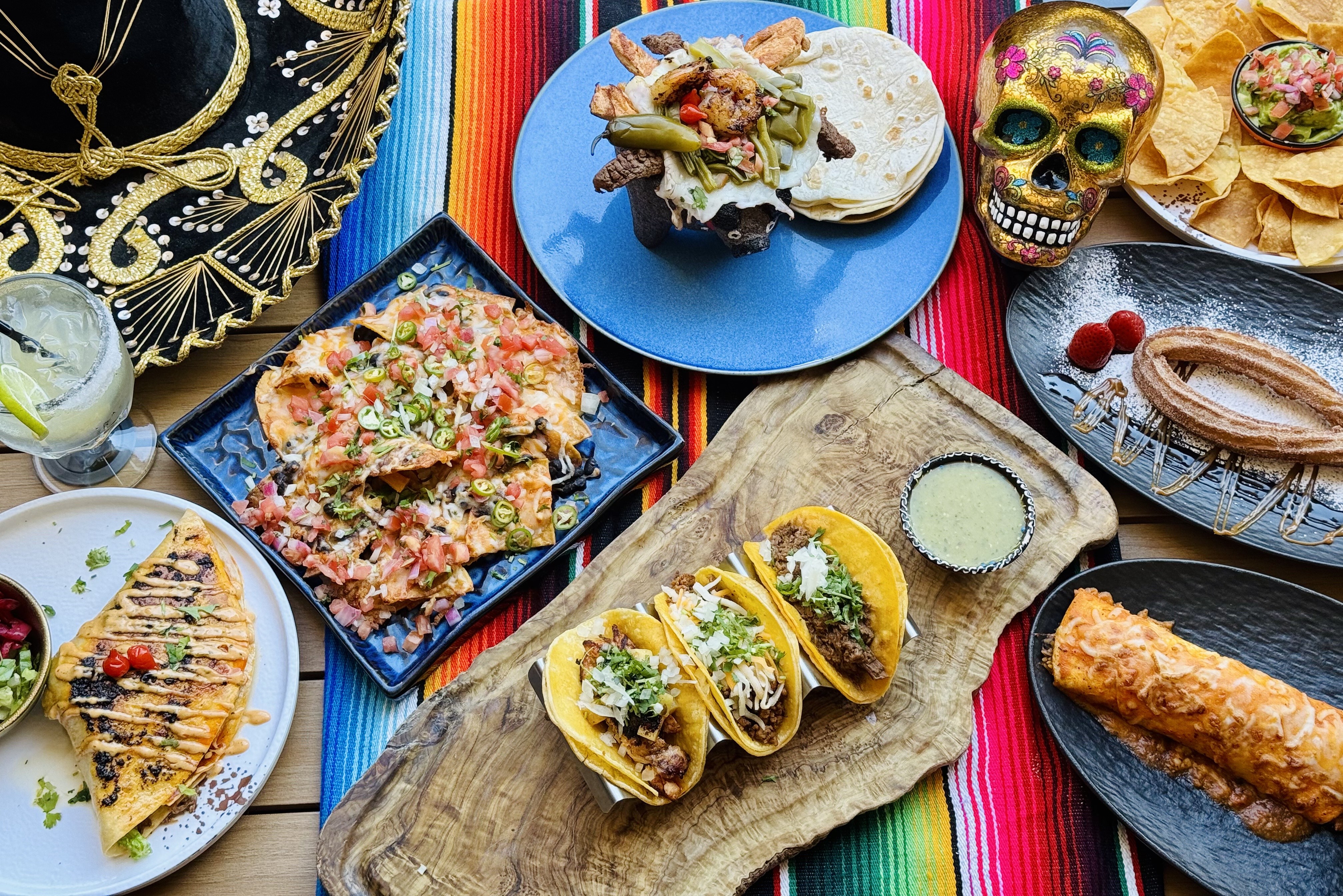 A close-up view of various baked goods on wooden plates, with warm, inviting colors and textures.