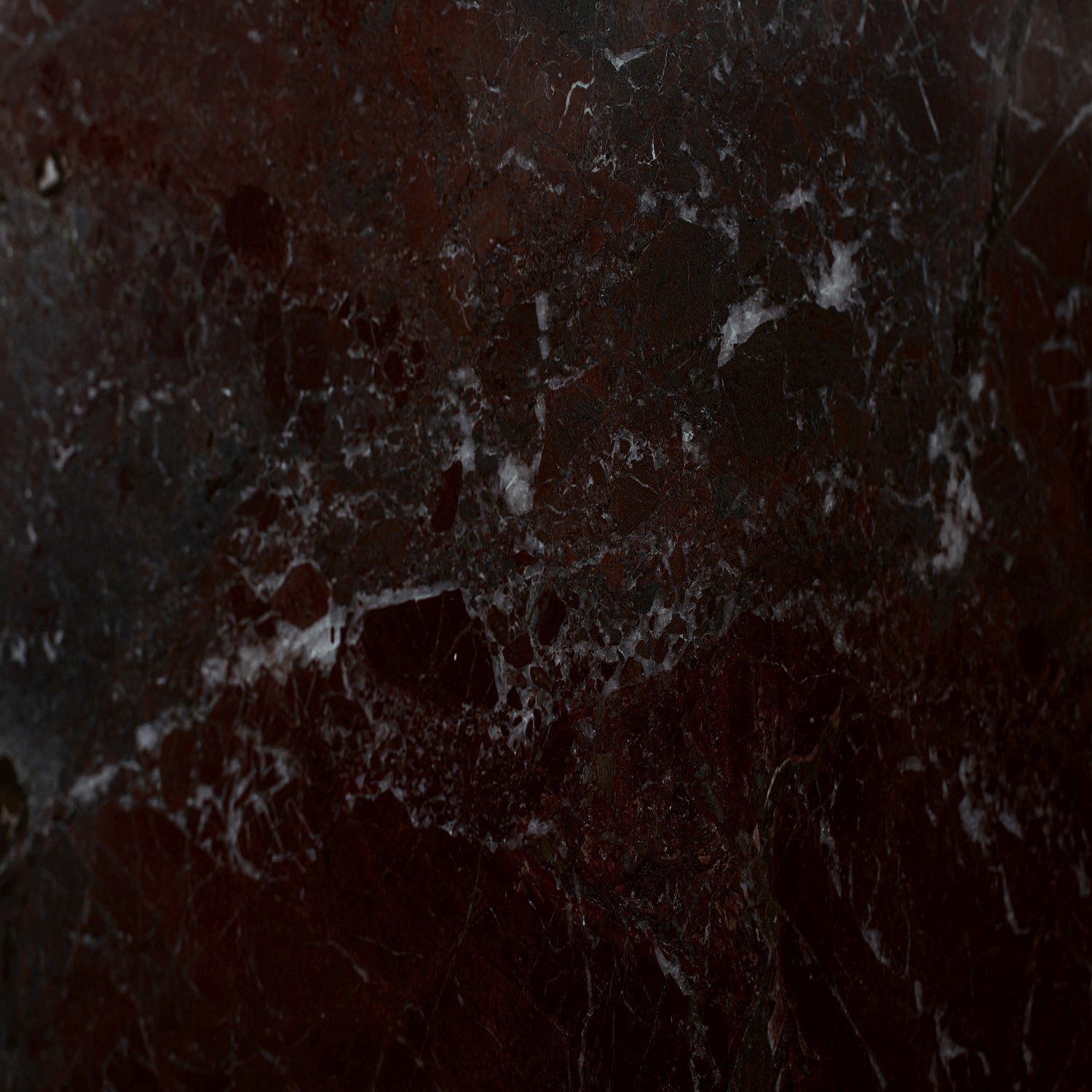 Detailed view of polished surface in deep red