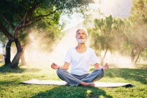 Senior man meditating