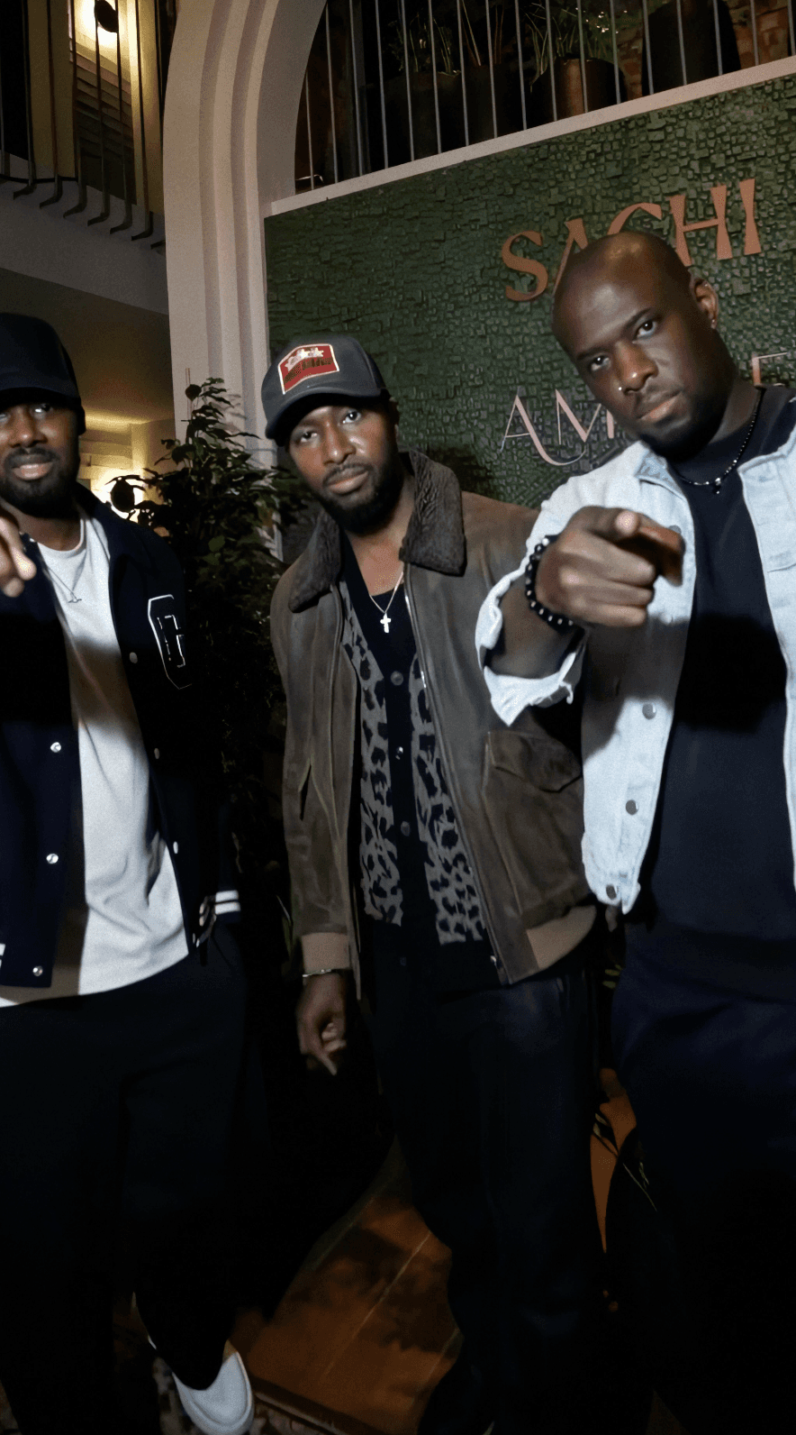 Couple embracing on street, bride's face obscured