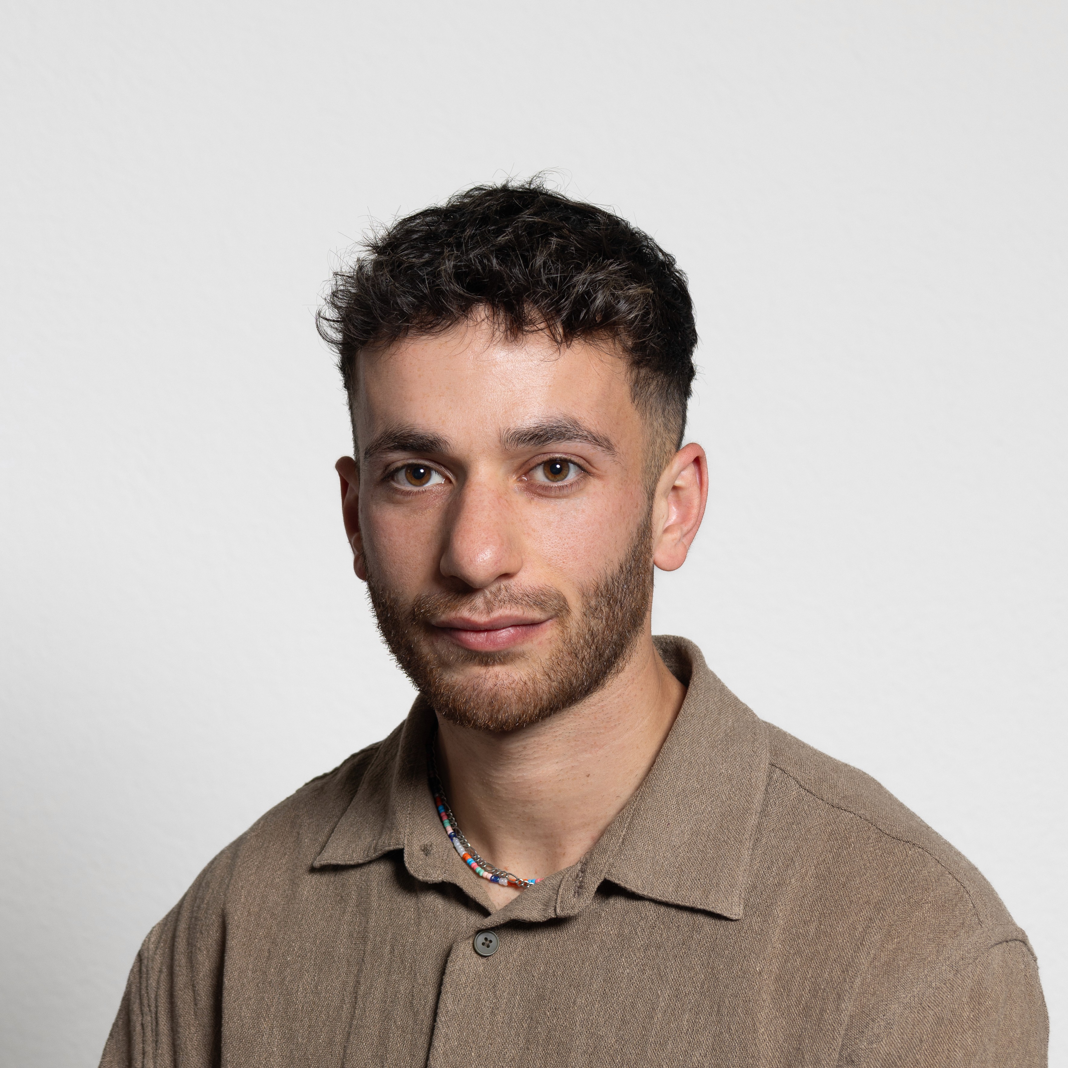 woman in white crew neck shirt smiling