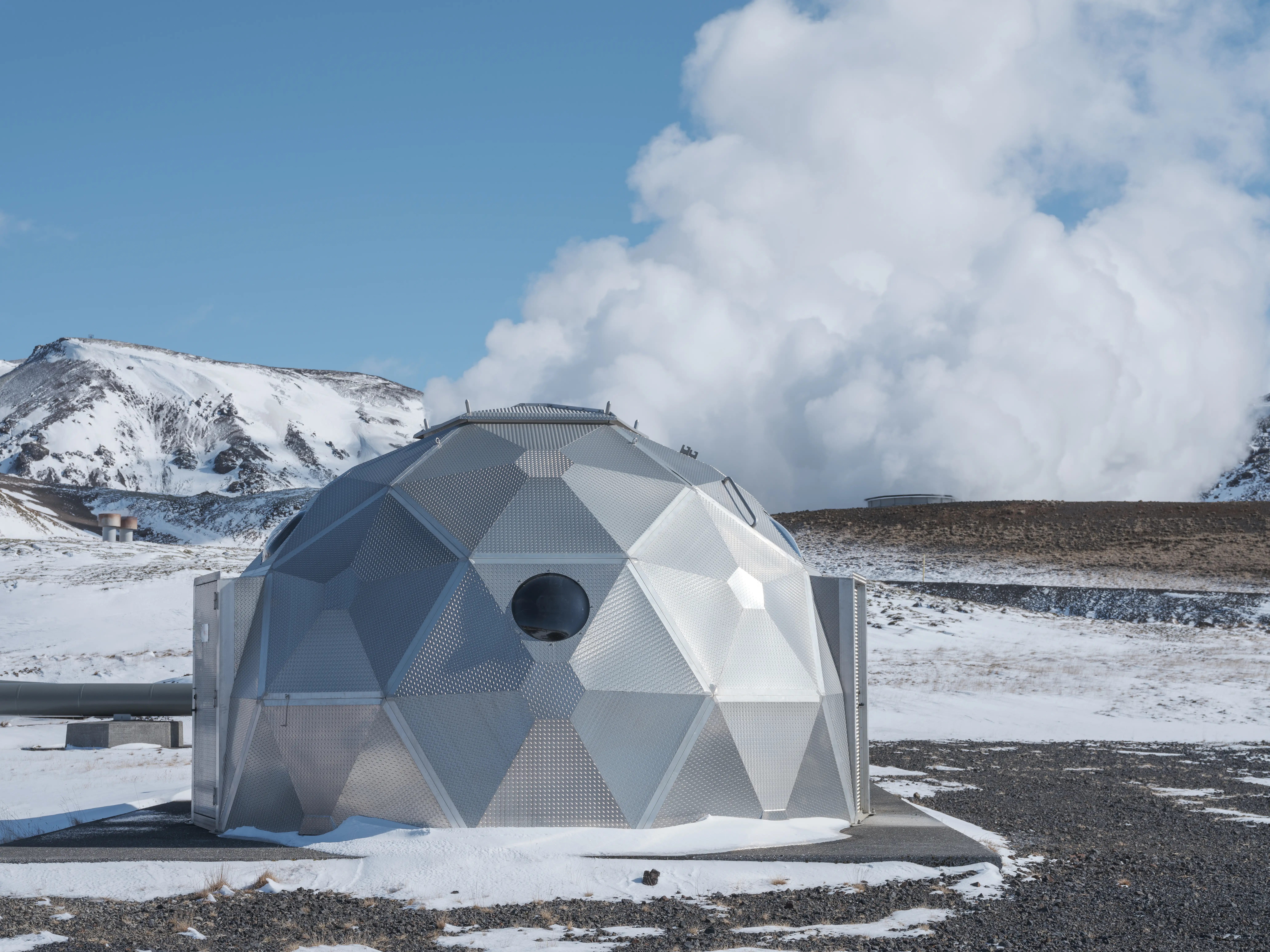 Close-up of an ON-branded electric vehicle charger connected to a car