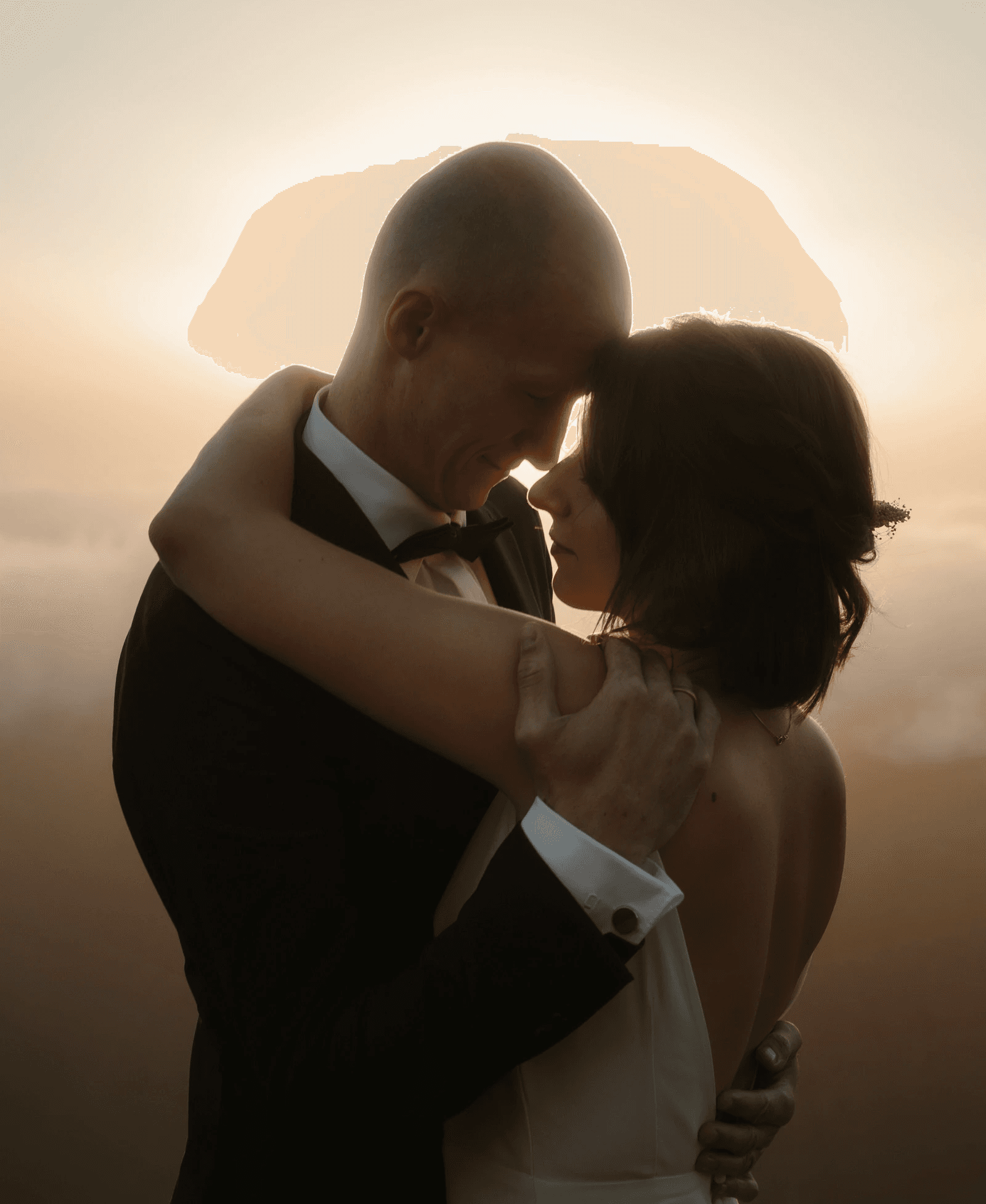 Europe elopement couple at sunrise above the clouds