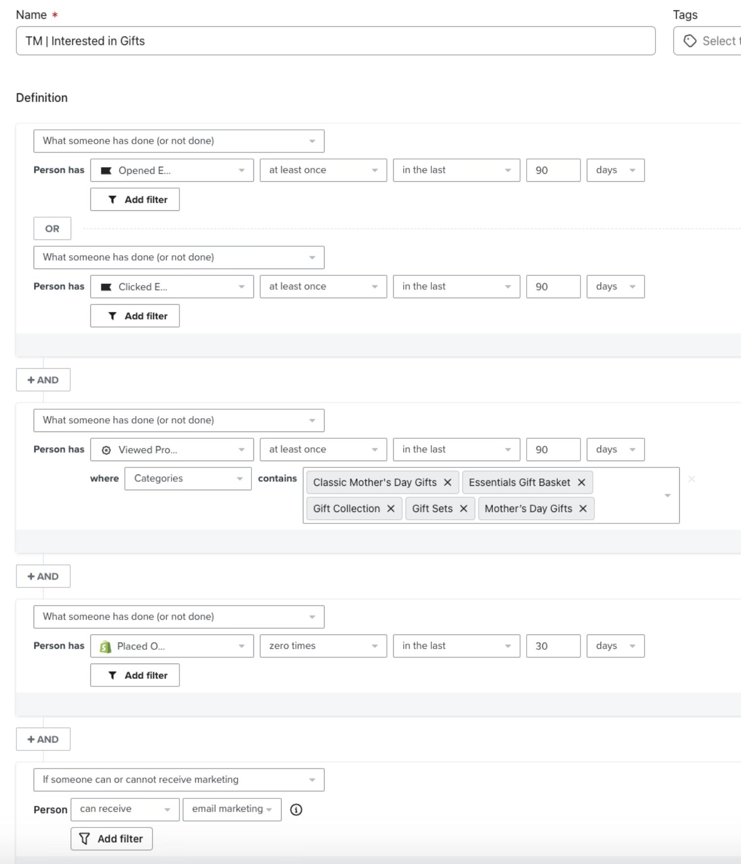 The image shows a Klaviyo segment named "TM | Interested in Gifts." It targets people who have opened or clicked an email in the past 90 days, viewed products from gift-related categories (like "Mother's Day Gifts" or "Gift Sets") in the last 90 days, haven't made a purchase in the past 30 days, and are eligible to receive marketing emails. Filters are organized with "AND" and "OR" conditions for precise targeting.