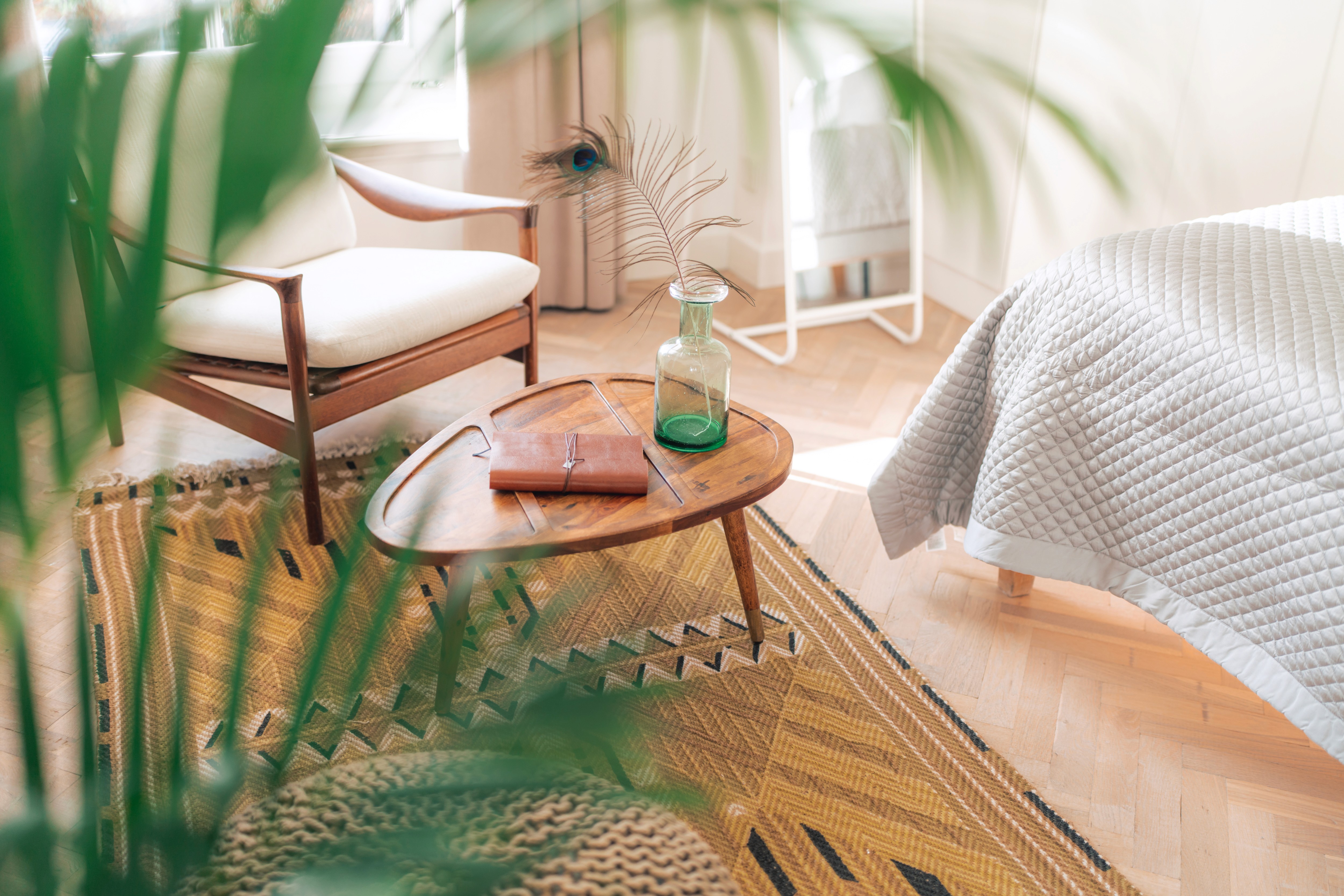 mountain valley with green grass and little village in the middle