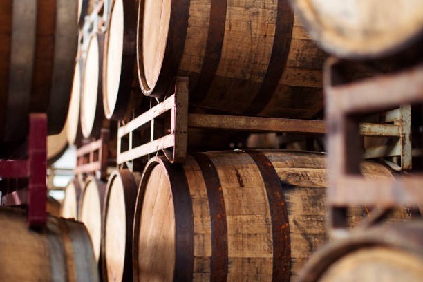 barrels in rack at brewery