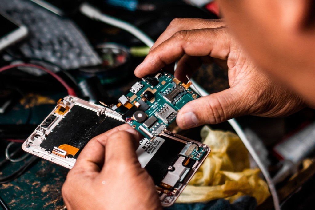 A photo of an electrinic module being worked on