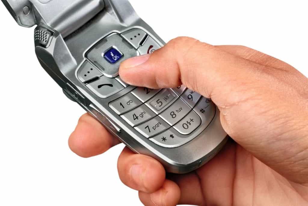 Extreme Frugality - Close up of a flip phone