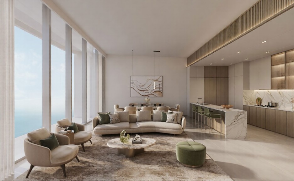 Open-plan living and dining area in a Hilton Residences unit with an integrated kitchen, modern furniture, and ocean views.