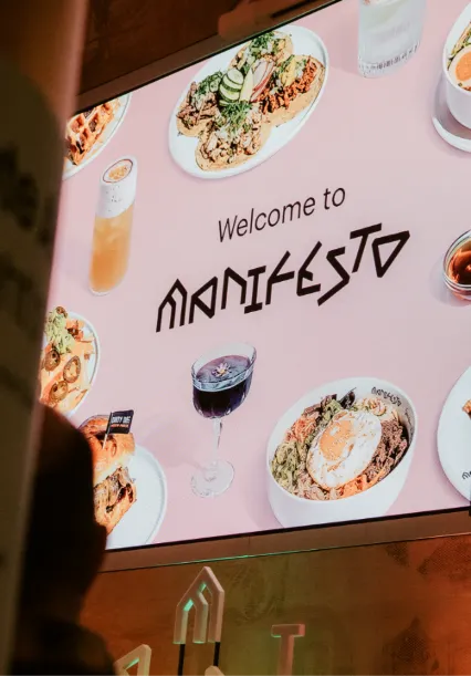 Manifesto Berlin signage helping visitors navigate restaurants, bars and vendors