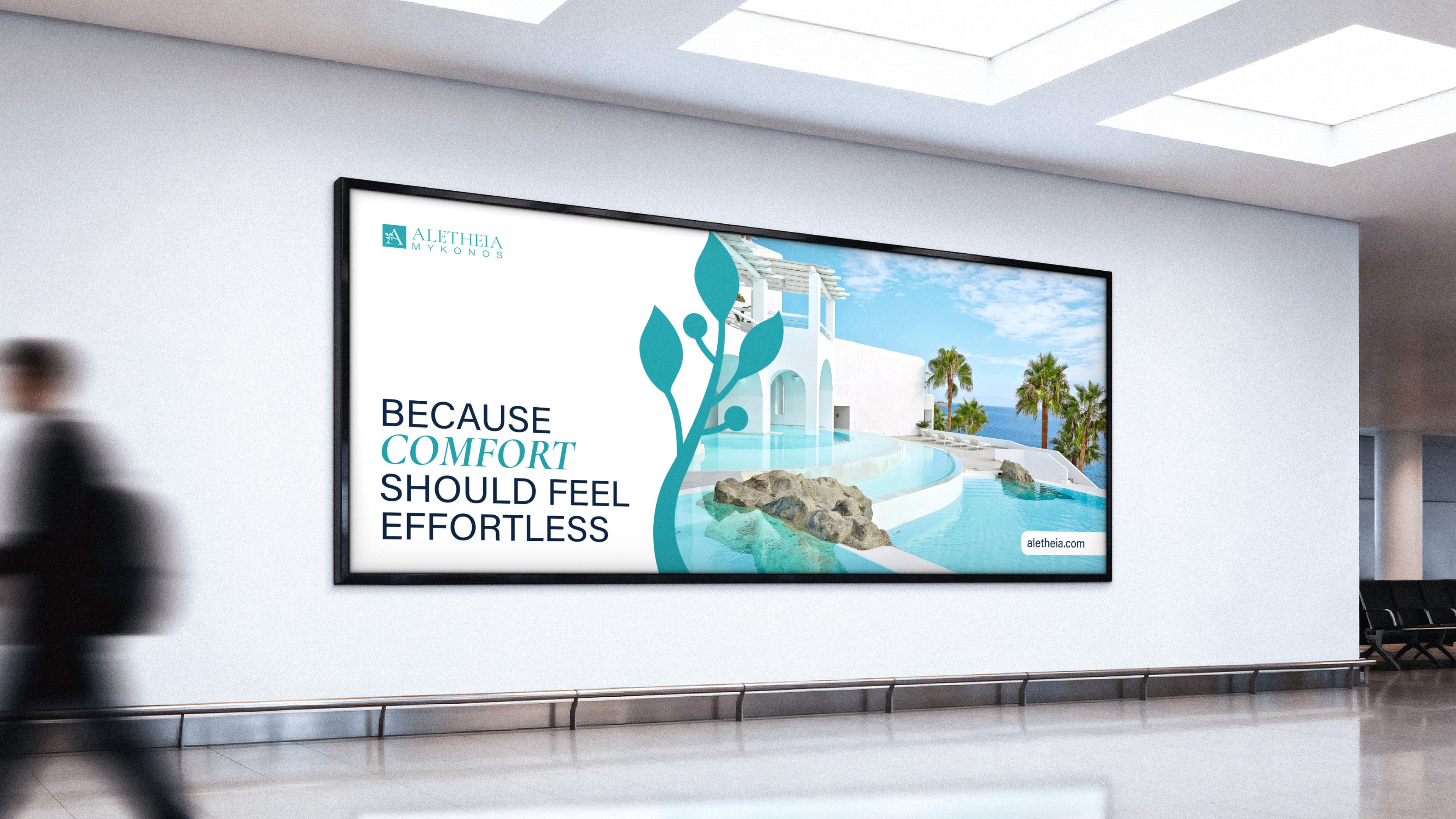 Airport billboard signage advertising a Greek hotel in Mykonos