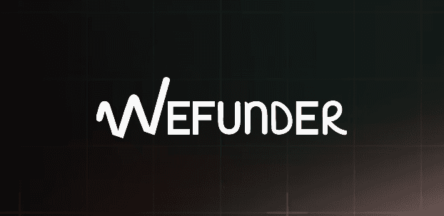 A person stands in a sandstone cave.