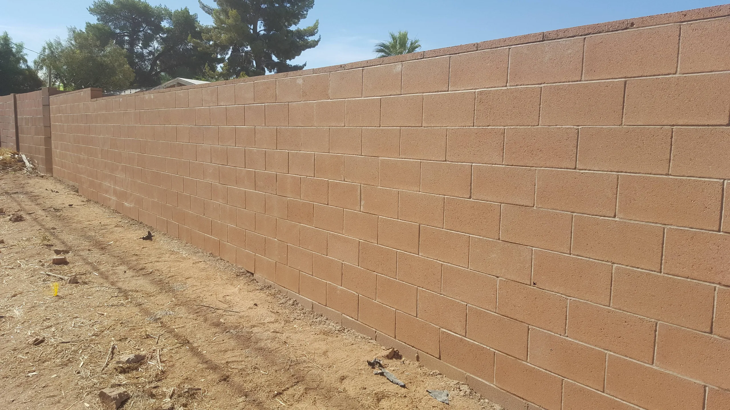 After: finished block privacy wall in Tucson by Silva Diversified Construction