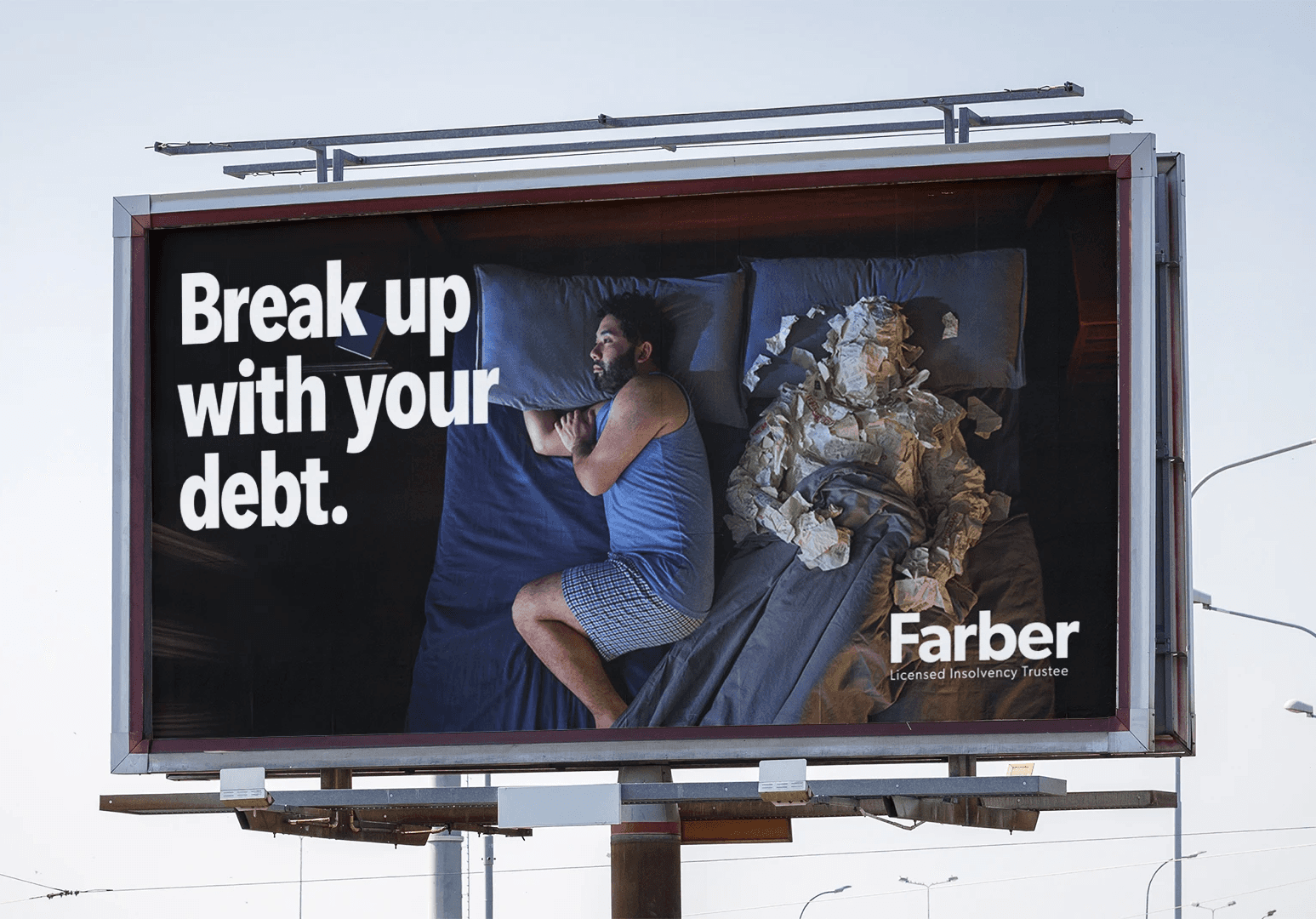 A child in a swimsuit playfully jumps with a water spray in a backyard, surrounded by toys and greenery.