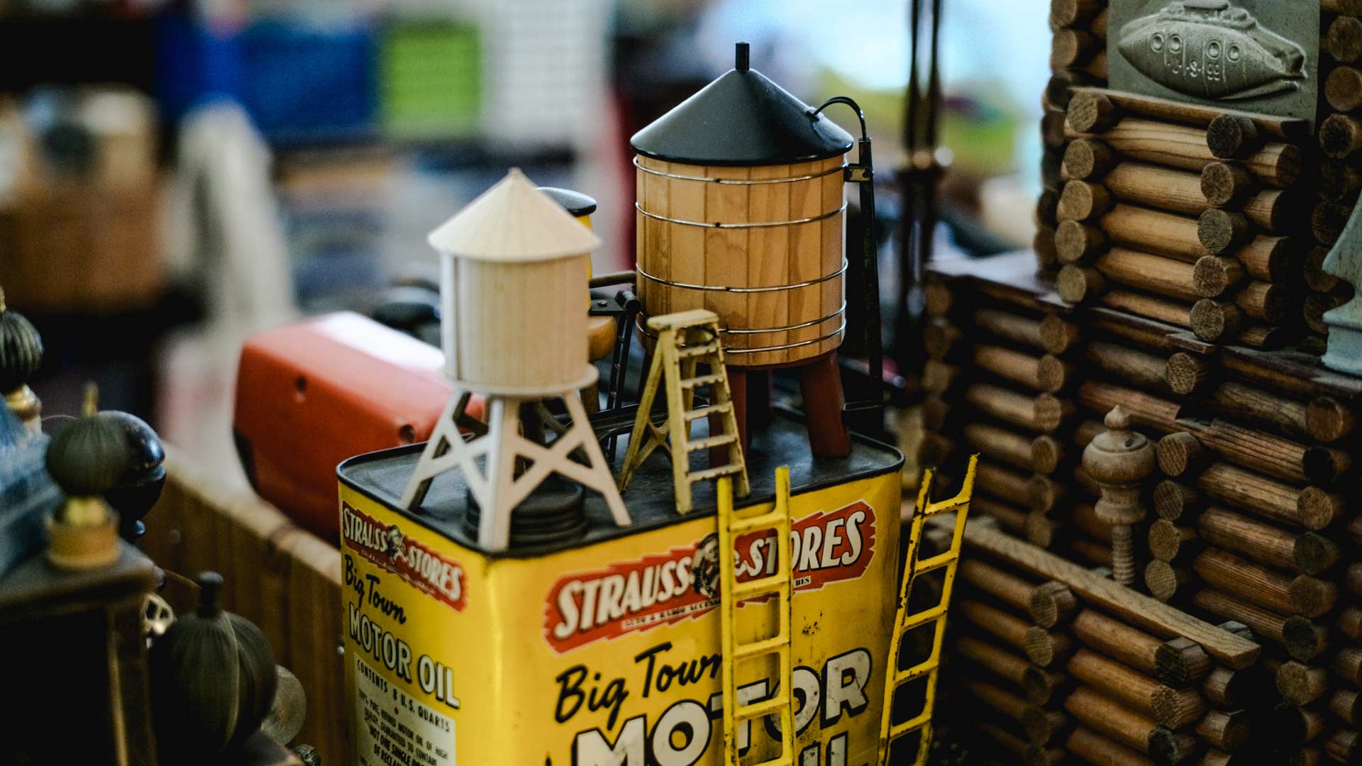 dorothy globus studio miniature water cooling towers on vintage motor oil can