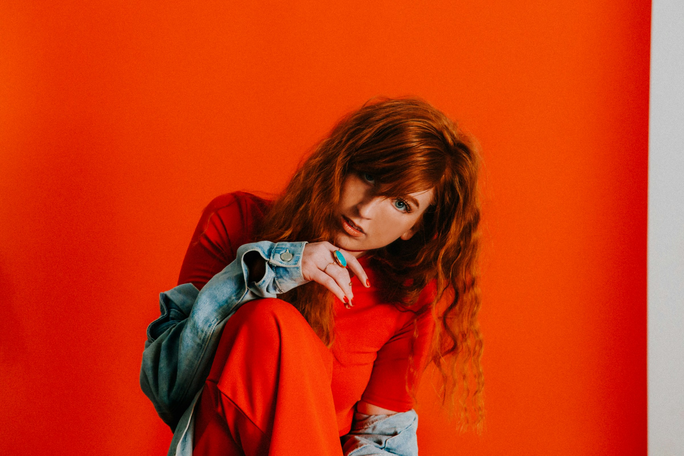 woman in red sweater - Preppy Definition