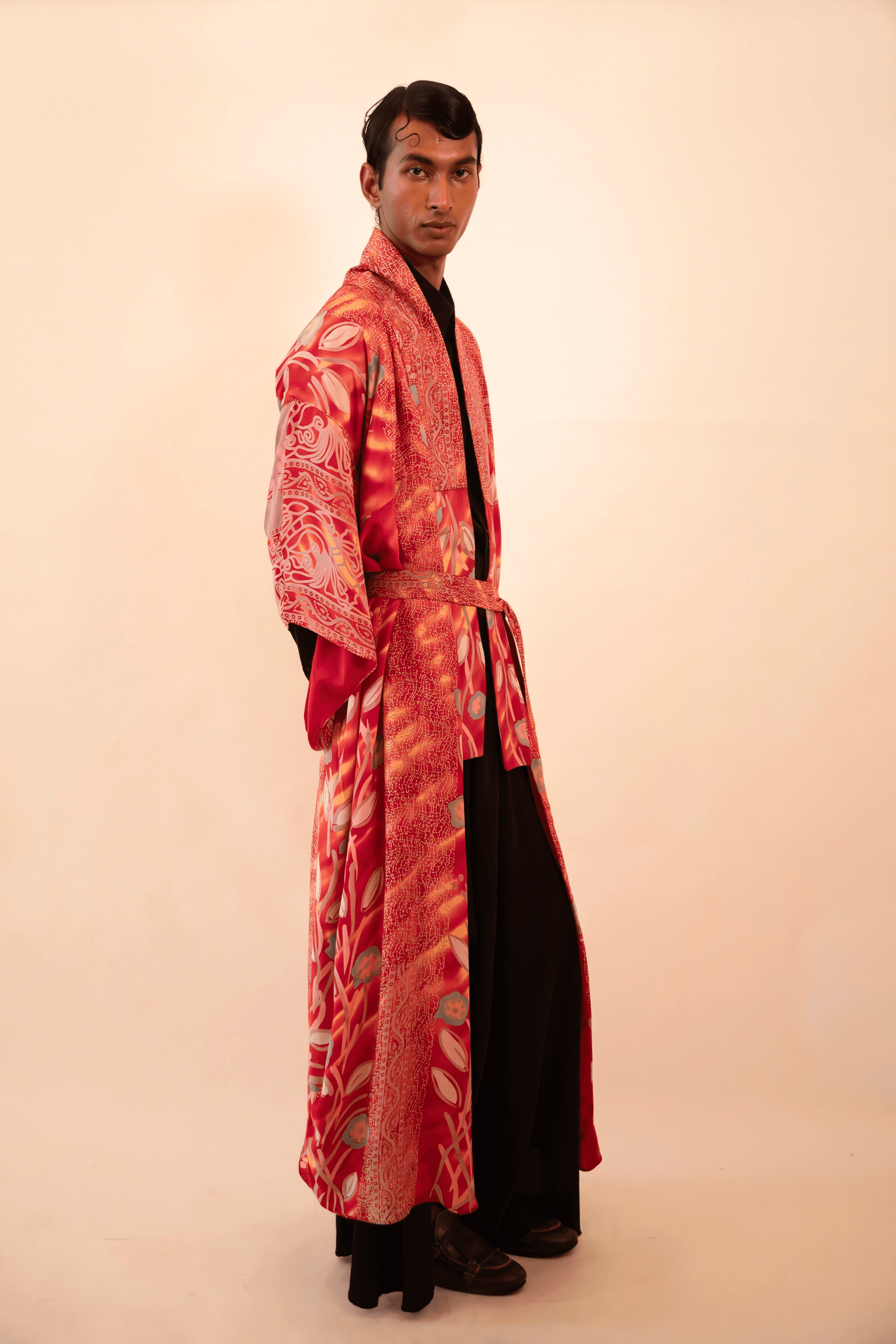 Lalita is our one-of-a-kind red printed silk kimono, handcrafted by skilled artisans in-house using a vintage silk sari.