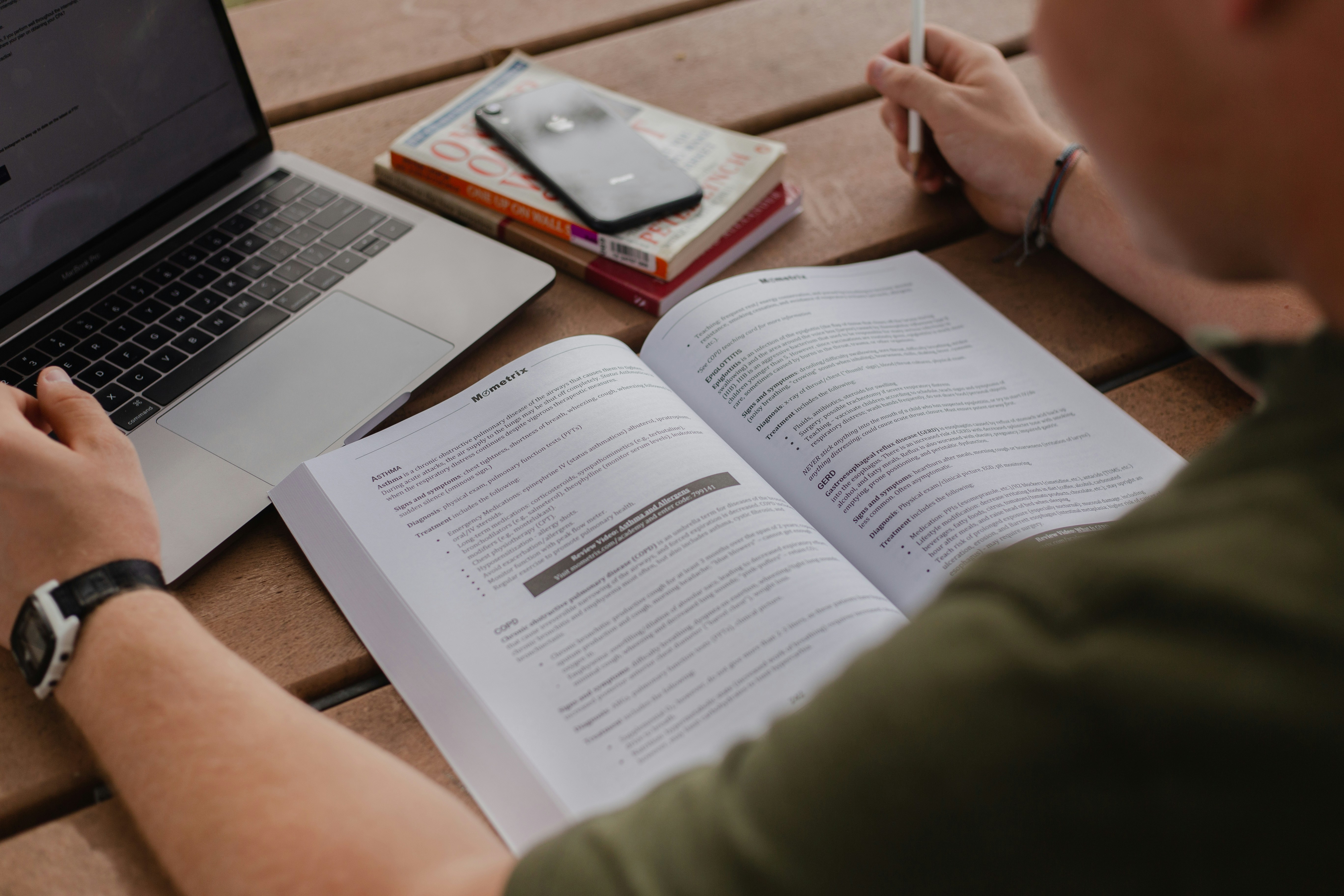 person with book infront of him - transition sentences