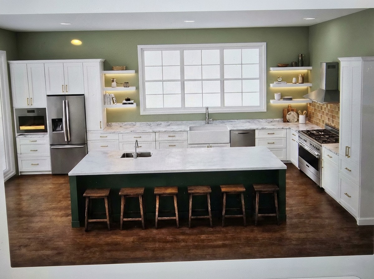 Sage green walls with forest green island, brass hardware, and zellige tile