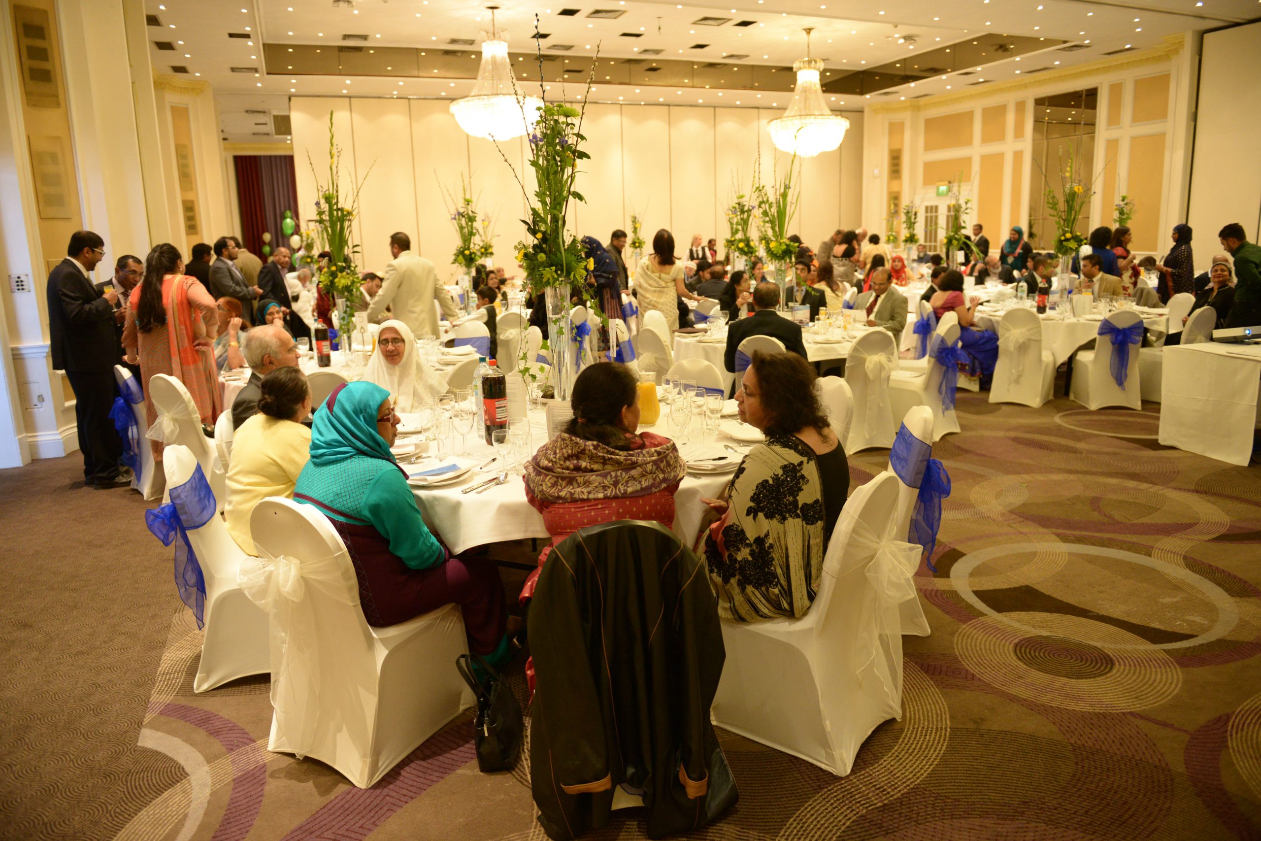 a black and white living room with a large tv