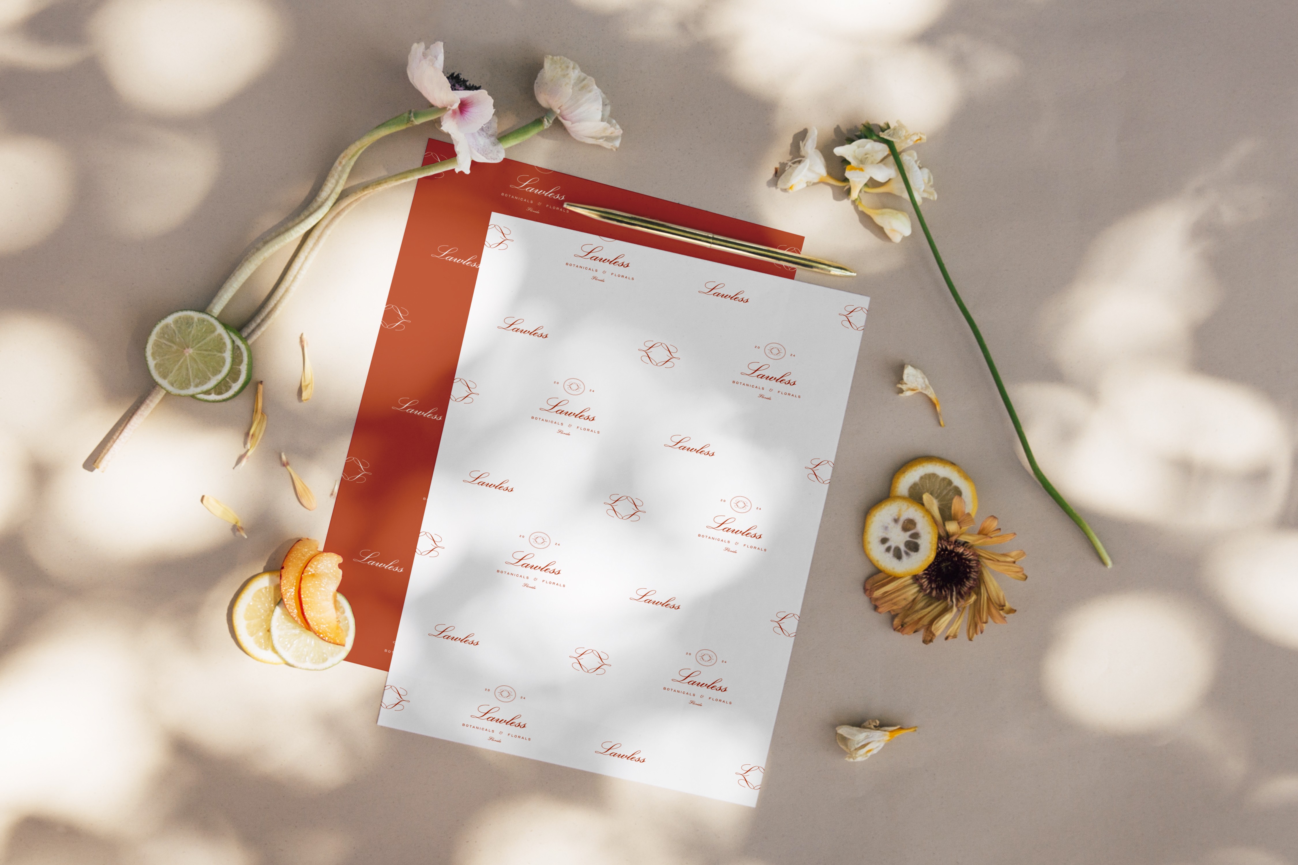 Elegant brand stationery for Lawless Botanicals & Florals, featuring a bespoke pattern design and a refined, nature-inspired color palette.