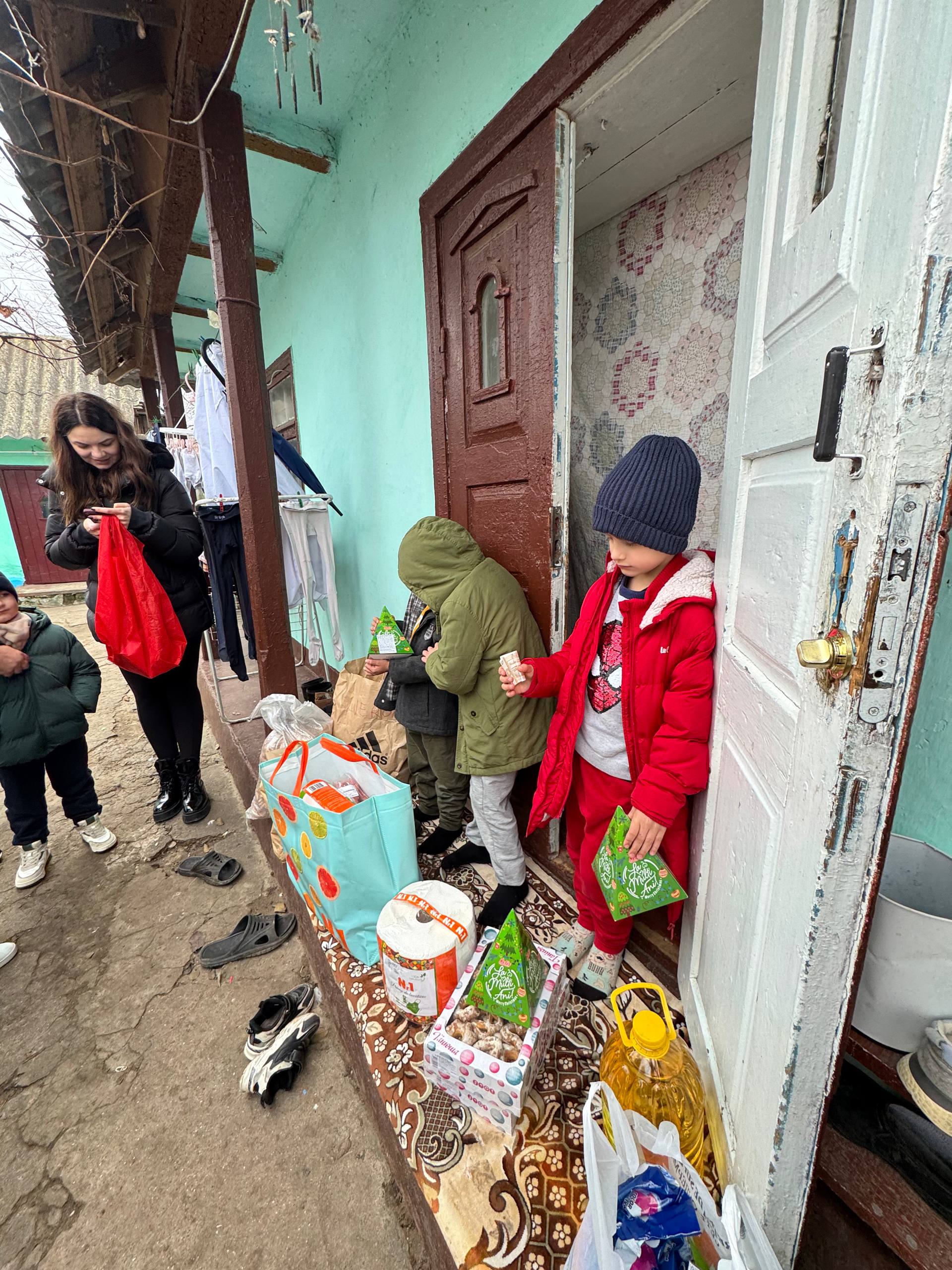 five toddlers near the window