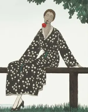 woman in black and white floral robe sitting on brown wooden bench