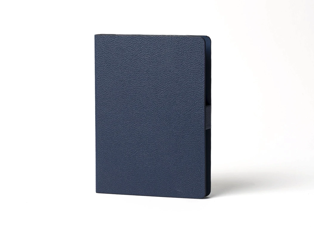 Front view of navy leather journal cover with rounded corners
