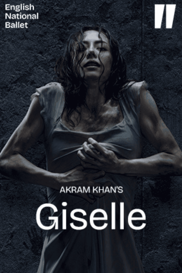 Dancers in Akram Khan's Giselle performing on stage in dim lighting.