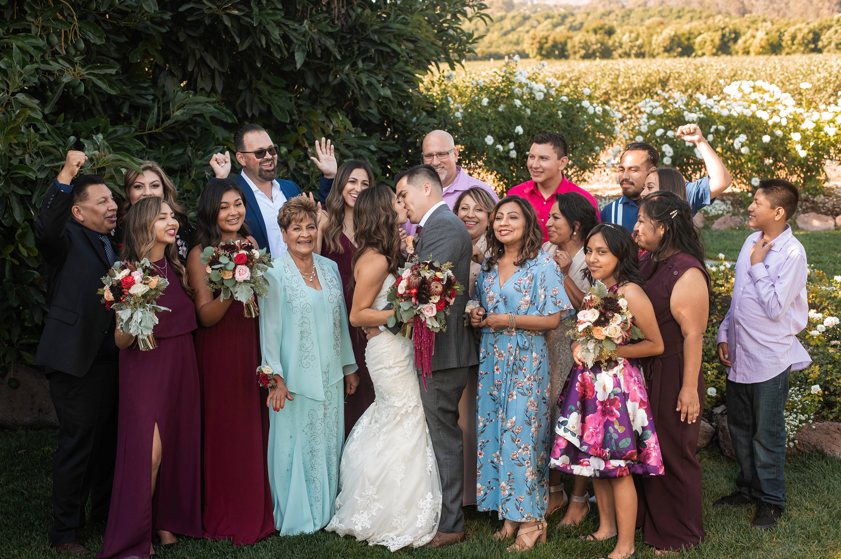 Flat lay wedding details with bouquet, rings, and sparkling bridal heels